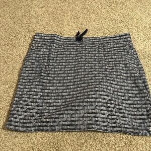 Blue and white skort with pockets.